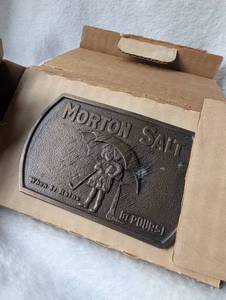 lot 1507 image: Morton Salt When It Rains It Pours Belt Buckle