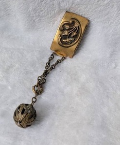 lot 1509 image: Brass Ornamental Vest Clip, Watch Chain with Filigree Ball