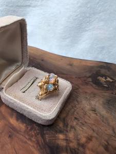 lot 3102 image: Avon Gold Tone Ring with Faux Opal Accents