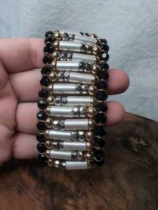 lot 3204 image: Beaded Bracelet with Silver Tubes and Black Faceted Beads
