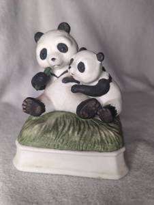 lot 2013 image: Panda Mother with Bamboo Base Music Box