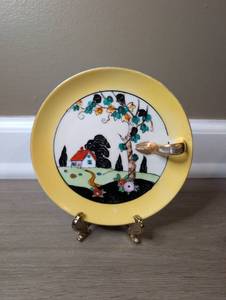 lot 2110 image: Decorative Plate with Countryside Scene Yellow Rim