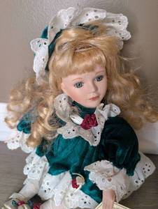 lot 2502 image: Doll Expressions Porcelain Doll