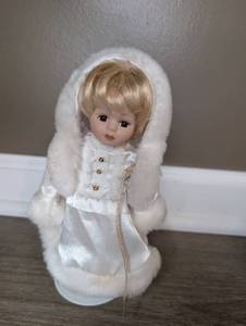 lot 2503 image: Mini Porcelain Doll with White Fur Hood&nbsp