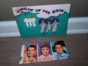 lot 2901 image: Singin in the Rain Modern Screen Pocket Pinup Set with Promotional Materials