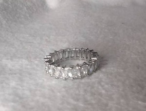 lot 6101 image: Silver-Tone Rhinestone Band Ring with Baguette-Cut Stones