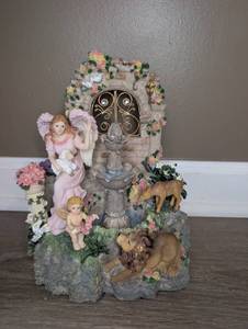 lot 6806 image: Decorative Garden Gate Figurine with Angels Animals and Flowers