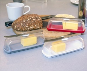 lot 1658 image: Set of 2 Butter Hub Butter Dishes with Knife & Magnetic Lids, White