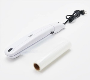 lot 1665 image: $49 Versa Compact Hand-Held Thermal Sealer