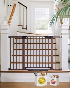 lot 1762 image: $120 Cumbor 30-48in Baby Gate for Stairs, Auto Close, Brown