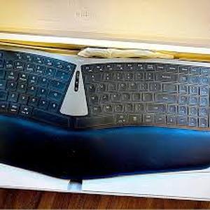 lot 1758 image: Nulea RT07B Ergonomic Wireless Keyboard Split Wrist Rest ...