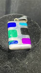 lot 11 image: Large Sterling Silver Pendant with Colored Enamel Sections and Metal Bail