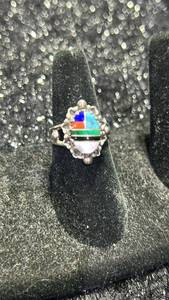 lot 22 image: Ring with Inlaid Gemstone Center and Diamond Surround