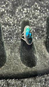 lot 23 image: Oval Stone Ring with Blue and Black Stone