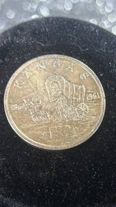 lot 42 image: 1961 Kansas Commemorative Half Dollar Covered Wagon 90 percent silver