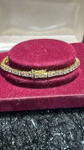 lot 50 image: Gold Tone Square Crystal Tennis Bracelet
