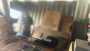 lot 1 image: TCL Flat Screen Television with Stand and Remote65 with remote and wall mount kit