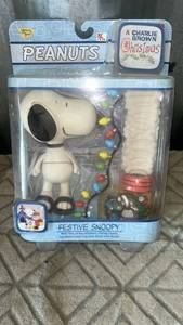 lot 15 image: New old stock  Peanuts Festive Snoopy Action Figure with Charlie Brown Christmas Accessories