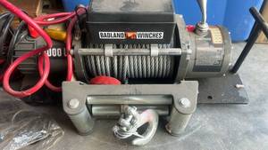 lot 20 image: Badland Winches 1200 LB Electric Winch 12V DC Motor
