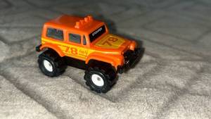 lot 72 image: Stomper Shaper 4x4 #78 Orange