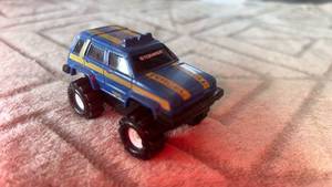 lot 73 image: Stomper 4x4 Monster Truck Toy Vehicle Blue Yellow
