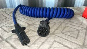 lot 77 image: Blue Coiled Power Cord 7-Pin Trailer Connector