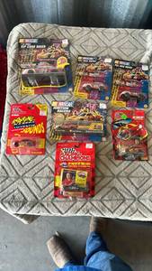 lot 95 image: NASCAR Die-Cast Toy Cars Lot of 6 Including Rip Cord Racer Pull Back Ignition Racing Champions