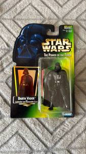 lot 102 image: 1997 Kenner Star Wars Power of the Force Darth Vader Lightsaber Removable Capelet
