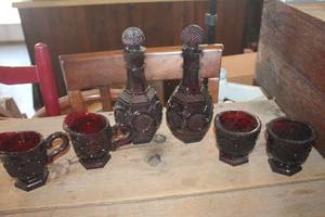 lot 3502 image: Vintage Avon Red Glass Wine Decater and More