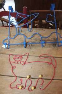 lot 3511 image: Metal Over the Door Hanging Rack & More