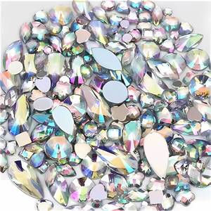 lot 73566 image: Mixed 1400pcs AB Color Gems Jewels Flatback Rhinestones, Assorted Shapes Rhinestone for Crafts, Face Art Gem Jewel for Crafting, Acrylic Gemstones DIY Halloween Party Decorations (White AB) - Retail $7