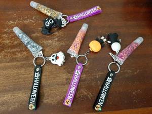 lot 28706 image: 4pcs Halloween Face Glitter Gel, Halloween Keychain with Orange Purple Skull Pumpkin Body Glitter Face Paint, Chunky Glitter for Face Body Hair for Party Rave Music Festival Carnival Makeup - Retail $10