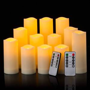 lot 28722 image: 12 Pack Flameless Candles Battery Operated Waterproof Led Candles (D2.2 X H4 5 6 7) Candles with 2 Remotes - Retail $19