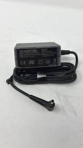 lot 183 image: AC Adapter Model HH06S-XXYYZZA 20V 3.25A Power Supply - Retail $0