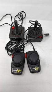 lot 188 image: Paddle Video Game Controllers and Joysticks Lot of 4 - Retail $0