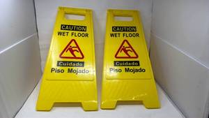 lot 208 image: Caution Wet Floor Safety Signs Yellow 2-Pack - Retail $0