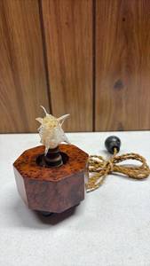 lot 288 image: vintage mid-century modern night light featuring an octagonal burl wood base and an artistic, spiky molded glass bulb cover. (Untested)