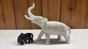 lot 299 image: Elephant Figurines 2-Pieces White Ceramic and Black Wood