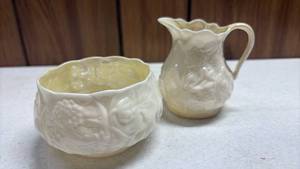 lot 304 image: Belleek Porcelain Cream and Sugar Set with Embossed Floral Design