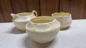 lot 305 image: Belleek Irish Porcelain Urchin Creamer and Sugar Bowl and Nautilus Companion Dish