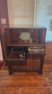 lot 249 image: WORKS RCA Victor Console cabinet with Glass Top television set in upper section, turntable and radio tuner
