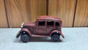 lot 113 image: Plymouth Sedan Cast Iron Toy Car Red