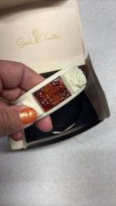 lot 177 image: Vintage Sarah Coventry Bangle Bracelet with Carved Medallions in Original Packaging