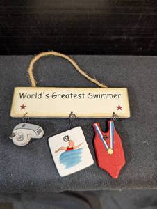 lot 141 image: Worlds Greatest Swimmer