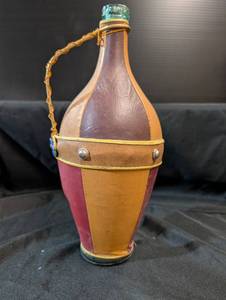 lot 165 image: Unique Leather wrapped jug