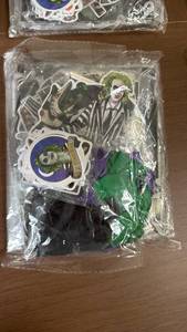 lot 104 image: Beetlejuice Character Birthday Decoration set including Tablecloth, stickers, balloons and more  - Retail $0