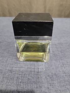 lot 1548 image: Michael Kors For Men Fragrance Partial Bottle