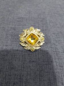 lot 1574 image: Gold Tone Ring with Yellow Cushion-Cut Stone