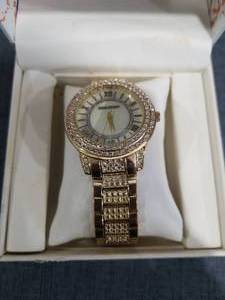 lot 1579 image: Steve Madden Womens Watch Gold-Tone Crystal Bezel Roman Numeral Dial