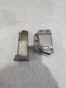 lot 1632 image: Magazine and Holster for Compact Pistol